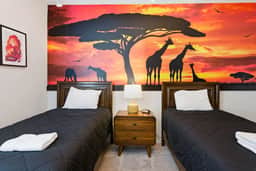 Upscale 9BR Stay with Pool and Themed Rooms
