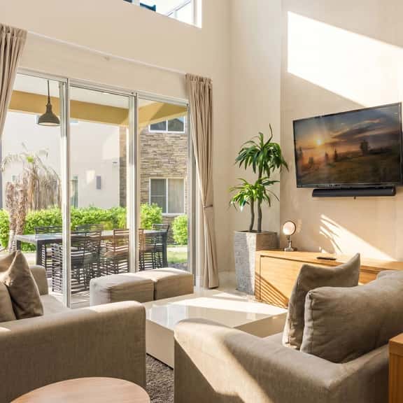 Designer 4BR Getaway, Sleek Laminate Floors - Image 1
